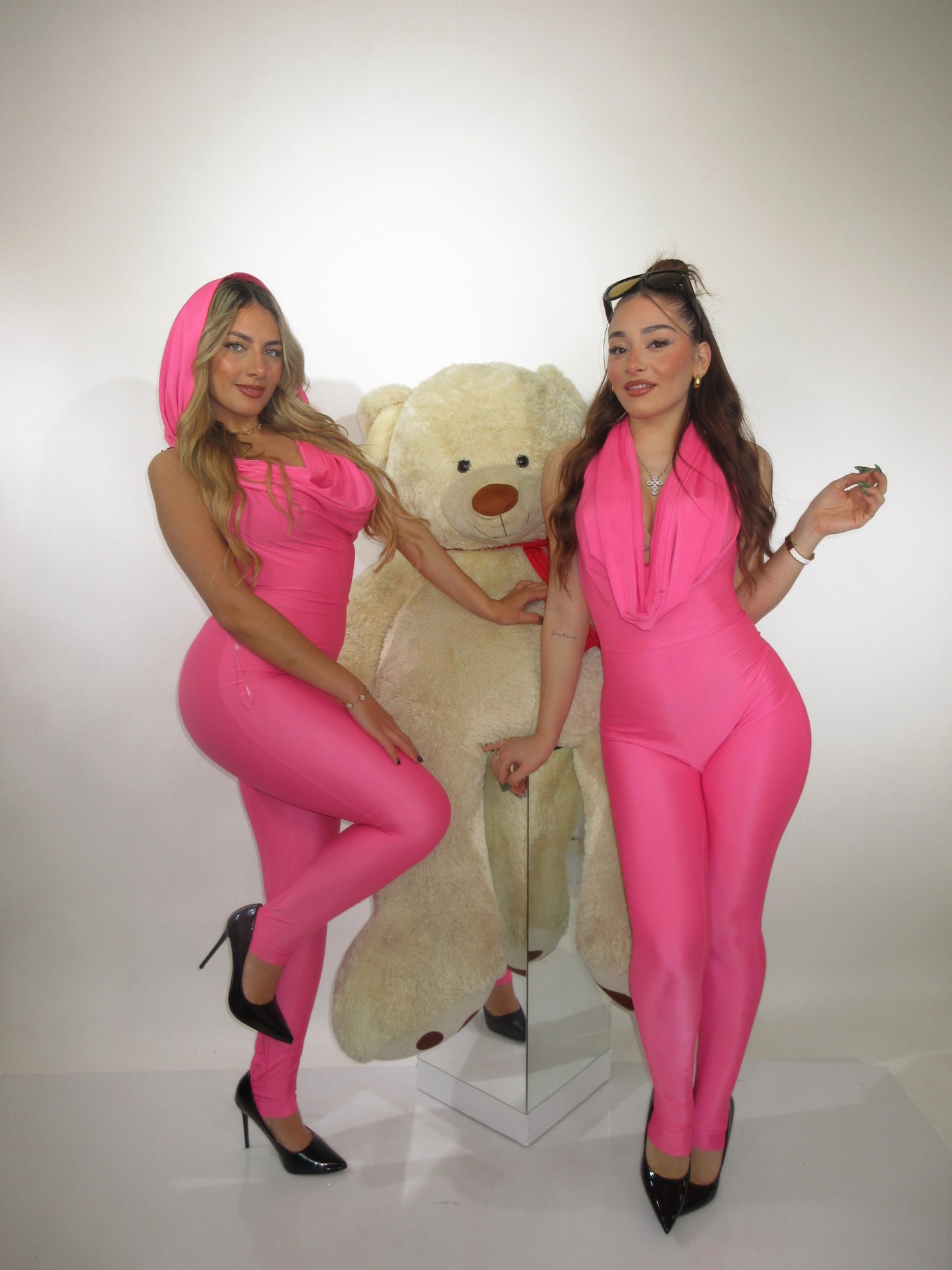Tutina Ava con cappuccio fuxia